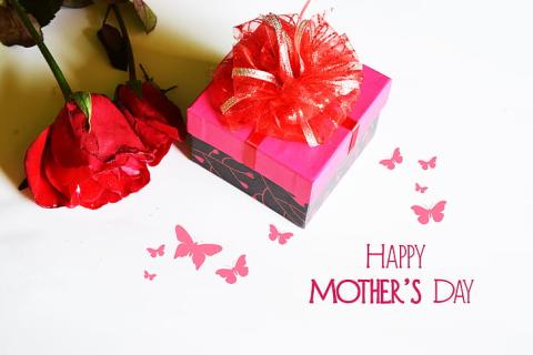 Text "Happy Mother's Day" along with a rose and a present box
