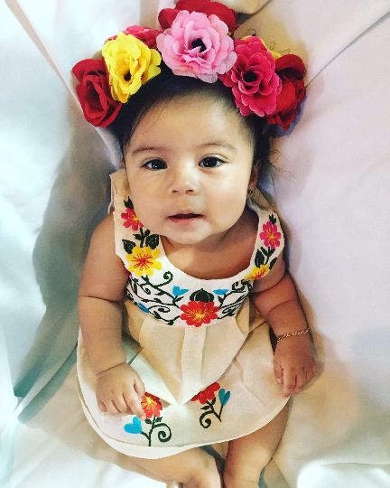 Young baby wearing a flower crown and a Mexican embroidered dress found on pinterest - intimalena.com