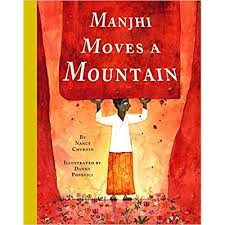 Book Cover Art of Manjhi standing in the middle of the passage he created by chiseling through the mountain.