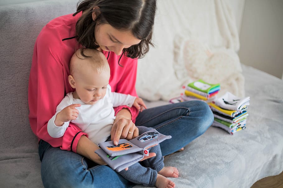 mother with child reading book