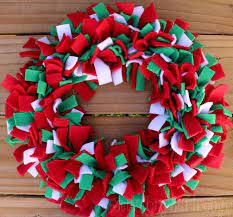 red, green and white wreath made from scraps of felt