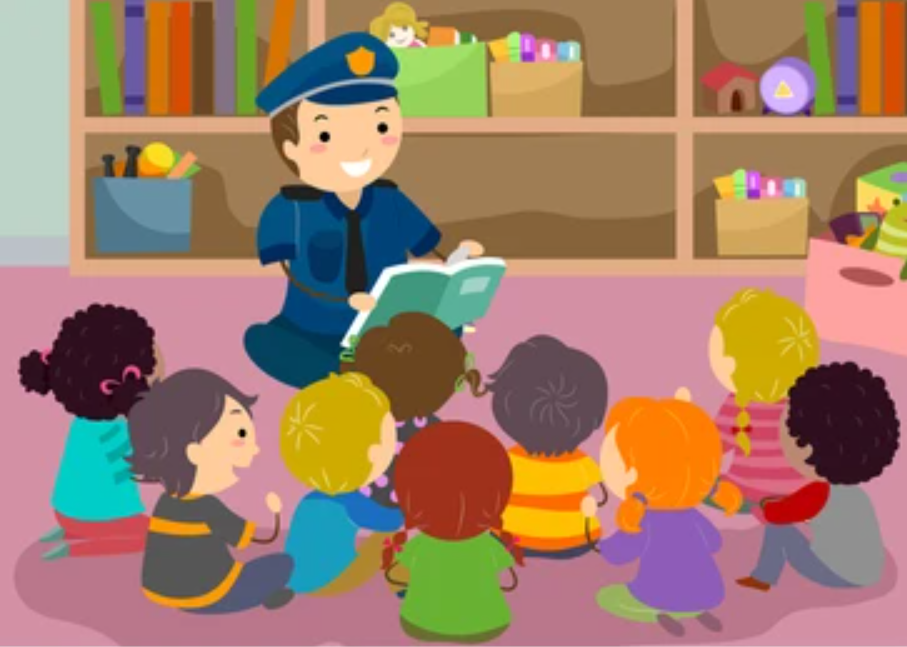 Policeman reading a book to children
