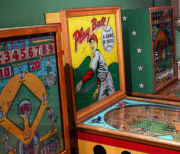 Collection of vintage Pinball Machines side by side. 