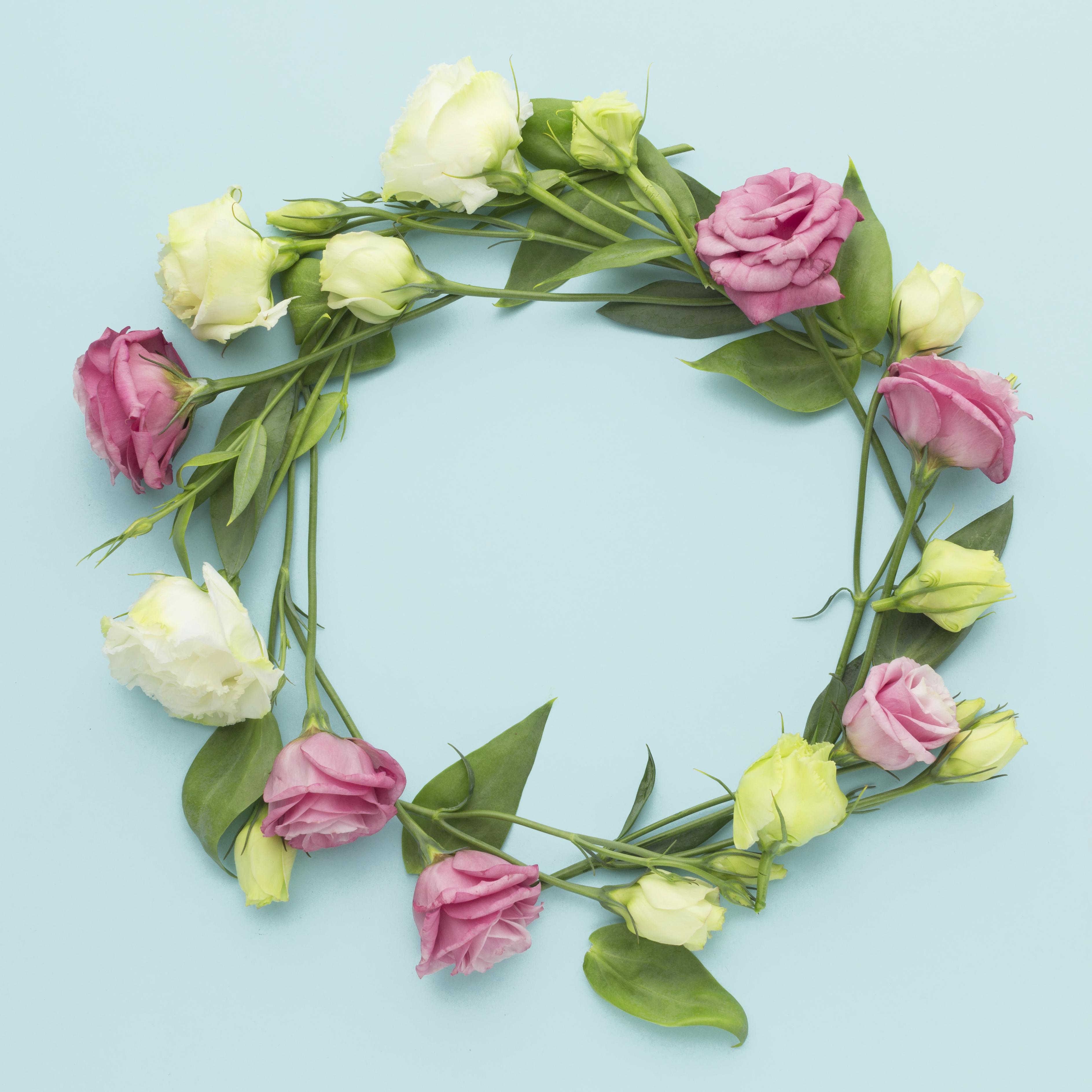 Wreath made of Flowers on Blue Background