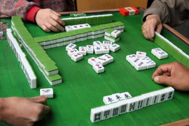 people playing mahjong