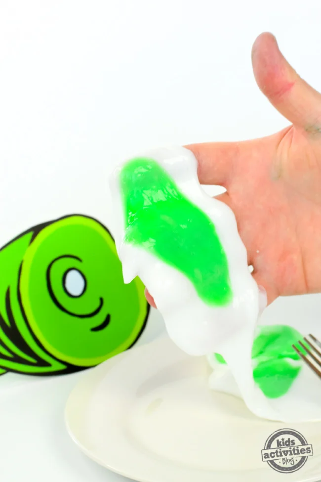 green ham with hand holding "egg"