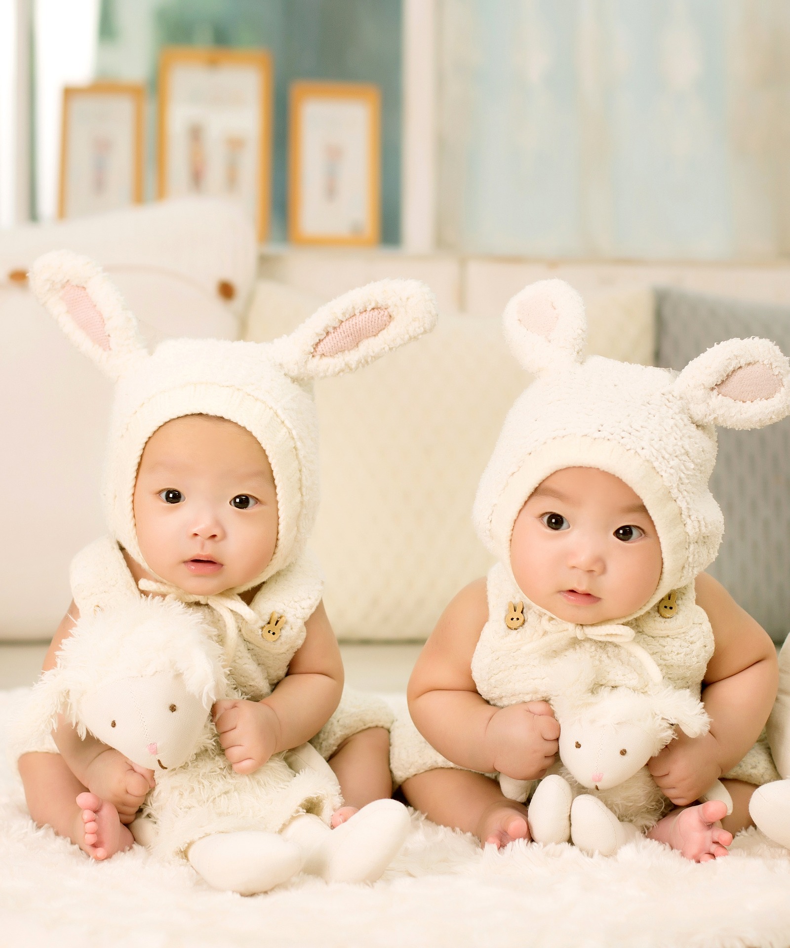 Two babies dressed as bunnies