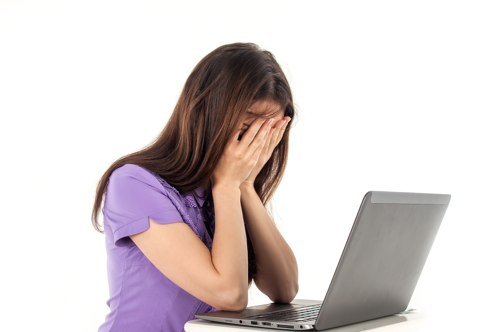 Crying girl with a laptop