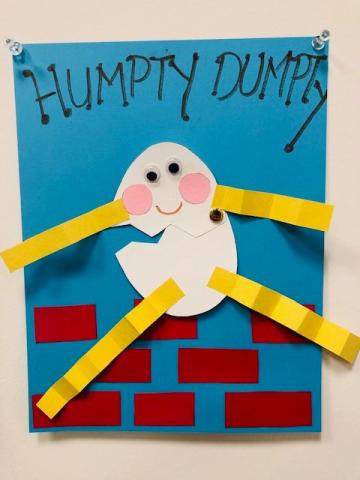 Example of an Easy Craft - Humpty Dumpty sitting on a Wall - made of construction paper.