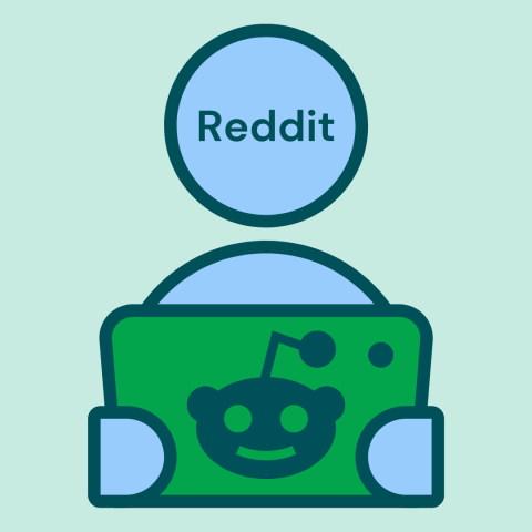 A figure holding a device featuring the Reddit logo