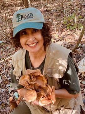 Presenter Eva Gordon holding a member of the kingdom Fungi 