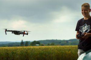 Kid flying a drone