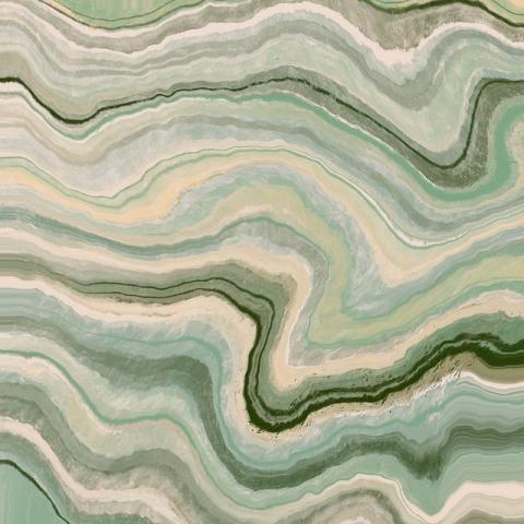 A stone surface that is marbled with tones of browns, greens, and blacks