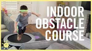 kid jumping on trampoline- words i o c.