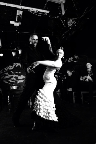 Black and white photo of Delilah and Antonio dancing Flamenco