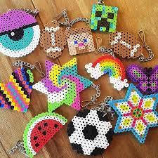 A selection of Perler bead keychain creations