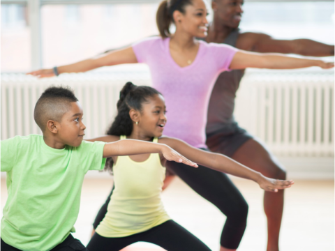 Family doing yoga together