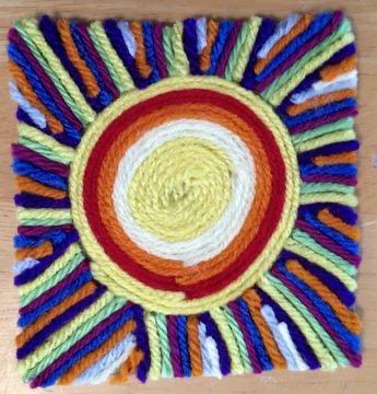 Huichol style sun made from yarn