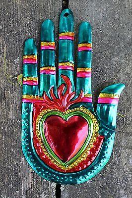 Hojalata Mexican Tin Art example, hand and sacred heart