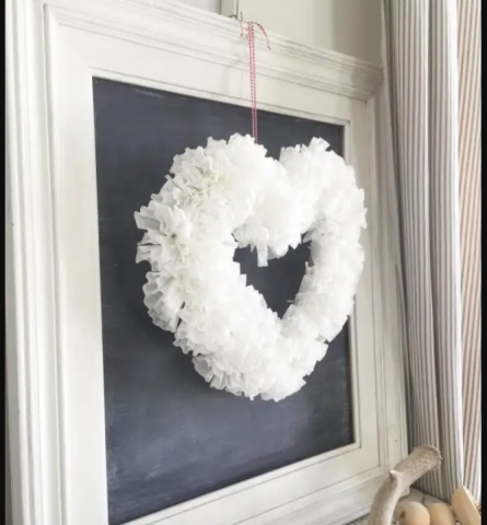 white coffee filter heart wreath on framed chalkboard