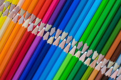 lines of color pencils creating a rainbow effect