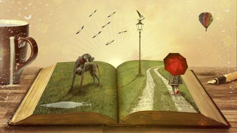 open book with grass, dog, child with umbrella, light pole, birds, and hot air balloon growing out of if