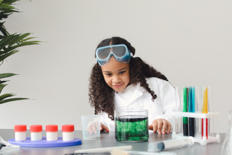 child doing science experiences 