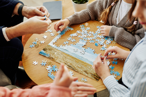 Family playing puzzles