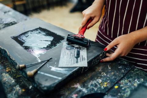 person doing printmaking 
