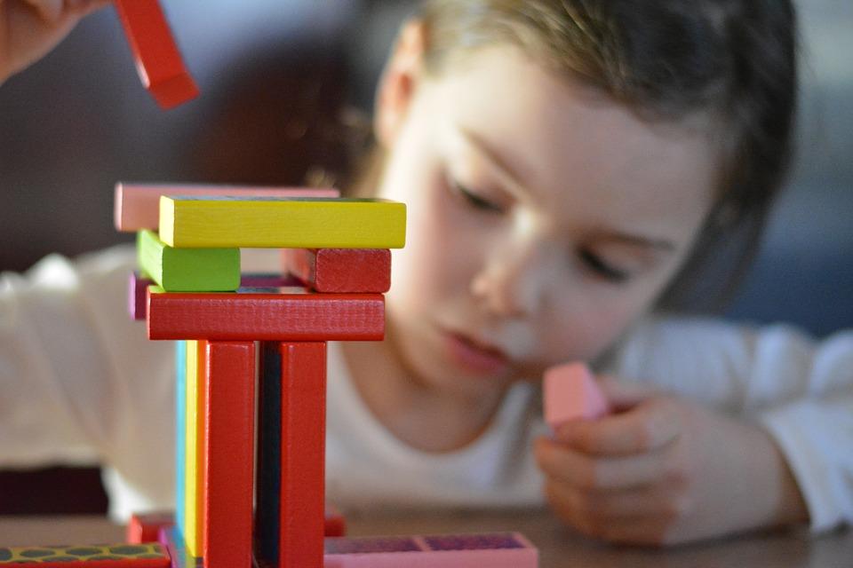 Girl Building with Blocks