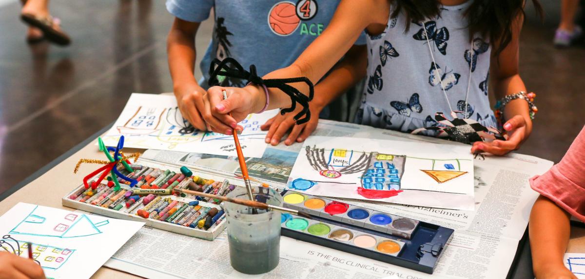 Children engaging in crafts.