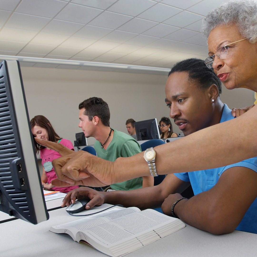 People using a computer together