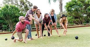 group of people throwing balls