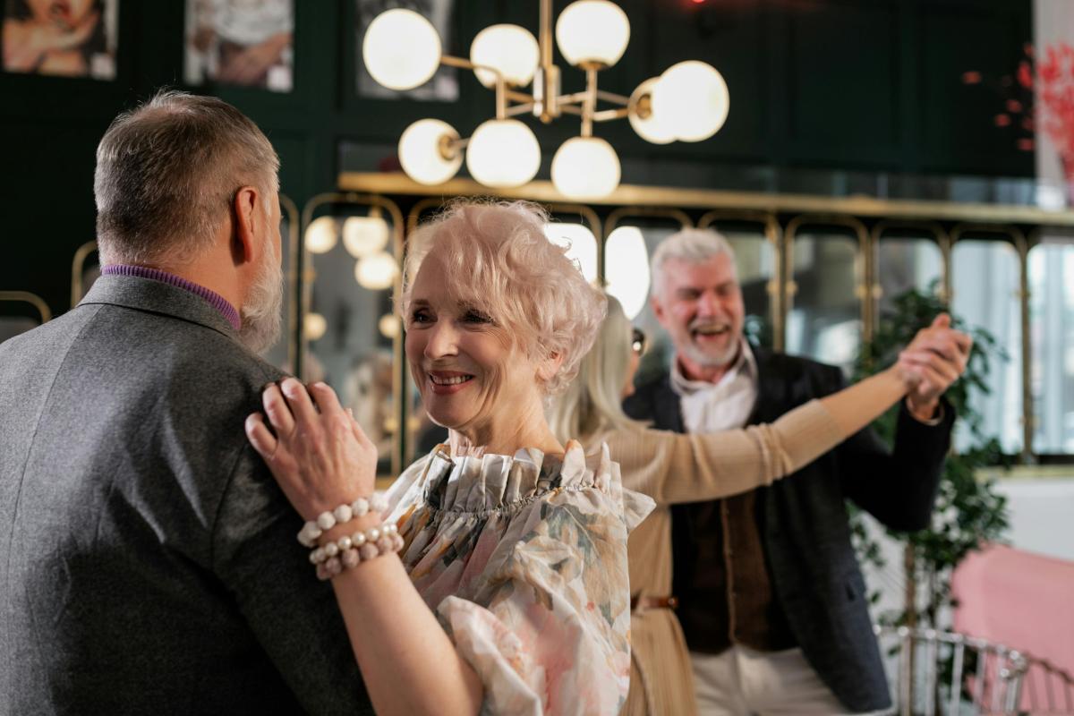 Two senior couples dancing