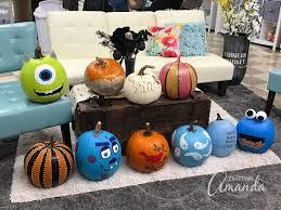 mini pumpkins painted different designs