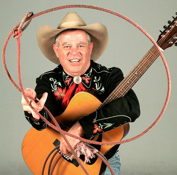 Cowboy ken with guitar and lasso 