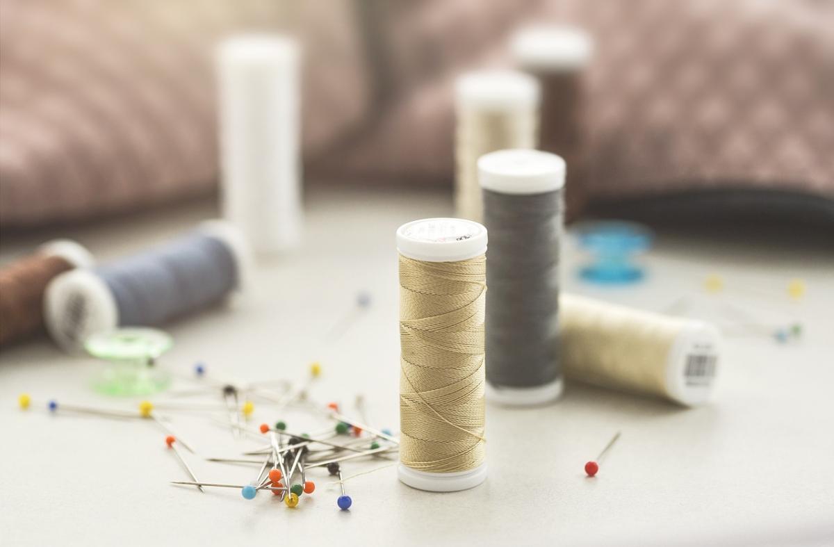 Thread, pins, and fabric