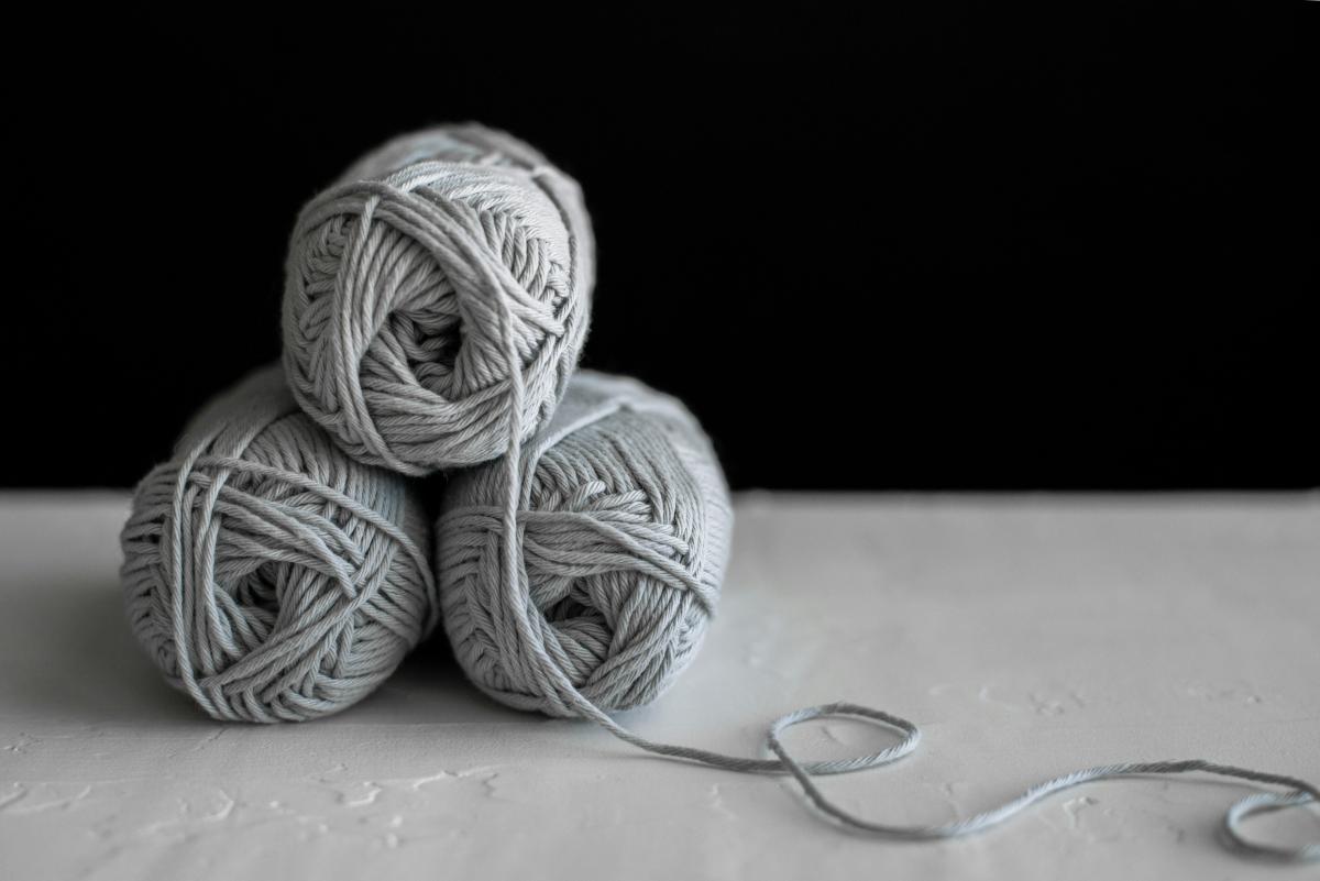 gray string in three rolls