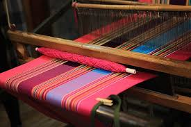 Sample of weaving in progress on a loom