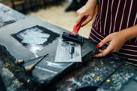 person doing printmaking 